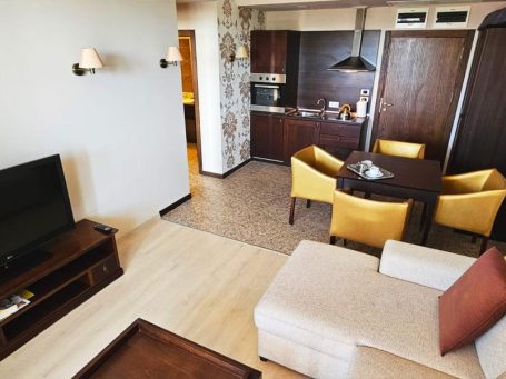 ID 1000 Living room with kitchen and dining room